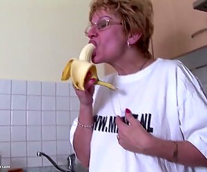 Old bitch fucks her stinky hairy cunt with bottle