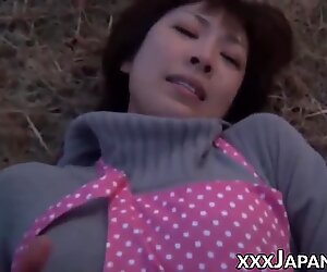 Playful Japanese babe takes it balls deep in her hairy pussy