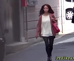 Asian babe urinating