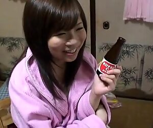 Kinky Natsuko gets wet in a shower and bubbles her pussy