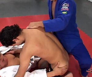 Three Muscled Dudes Enjoy A Hardcore Fuck Session After Wrestling!