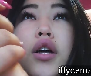 The asian nymphomaniac with the vibrator in the pussy excites