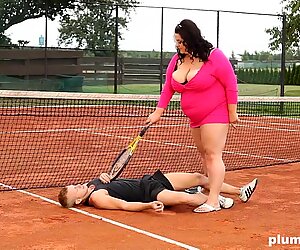 Obese woman facesits on her trainer at the tennis court