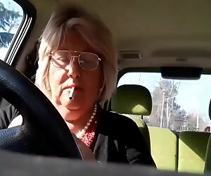 Italian granny masturbates in her car